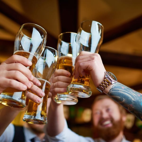 Friends toasting with beers